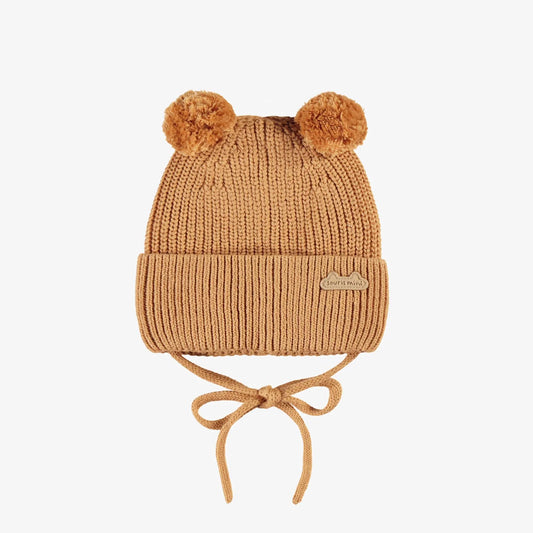 Brown knit beanie with pom-poms